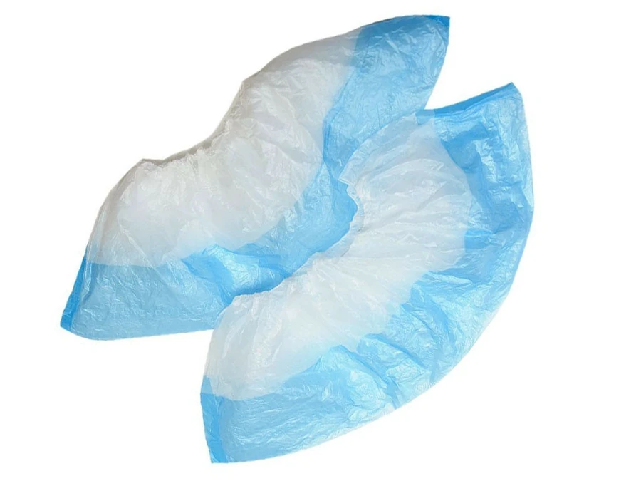 Поліетиленові бахіли, двоколірні Nail Perfect Shoe Covers Two-tone біло-блакитні 100 шт